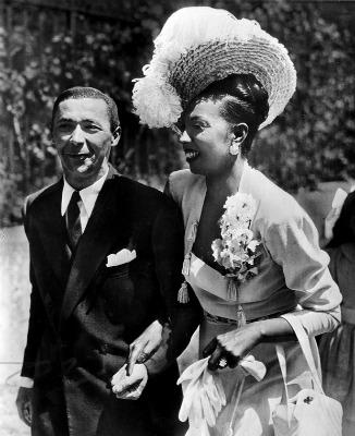 Josephine Baker Lovers, Face, Smile, Hairstyle, Photograph, Facial expression, White, Black, Flower, Flash photography, Standing