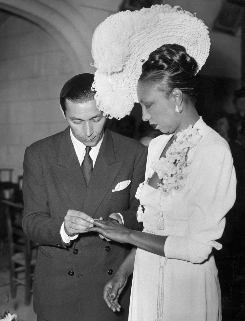 Josephine Baker Husband, Clothing, Outerwear, Hairstyle, Photograph, Facial expression, White, Coat, Black, Standing, Gesture