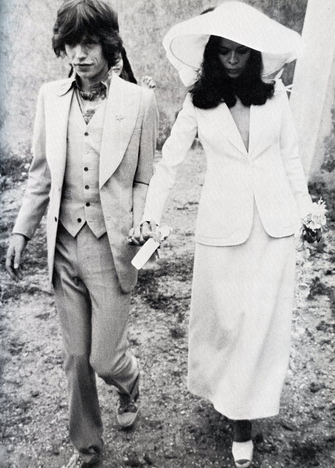 Bianca Jagger Wedding Suit, Outerwear, White, Black, Human, Sleeve, Standing, Gesture