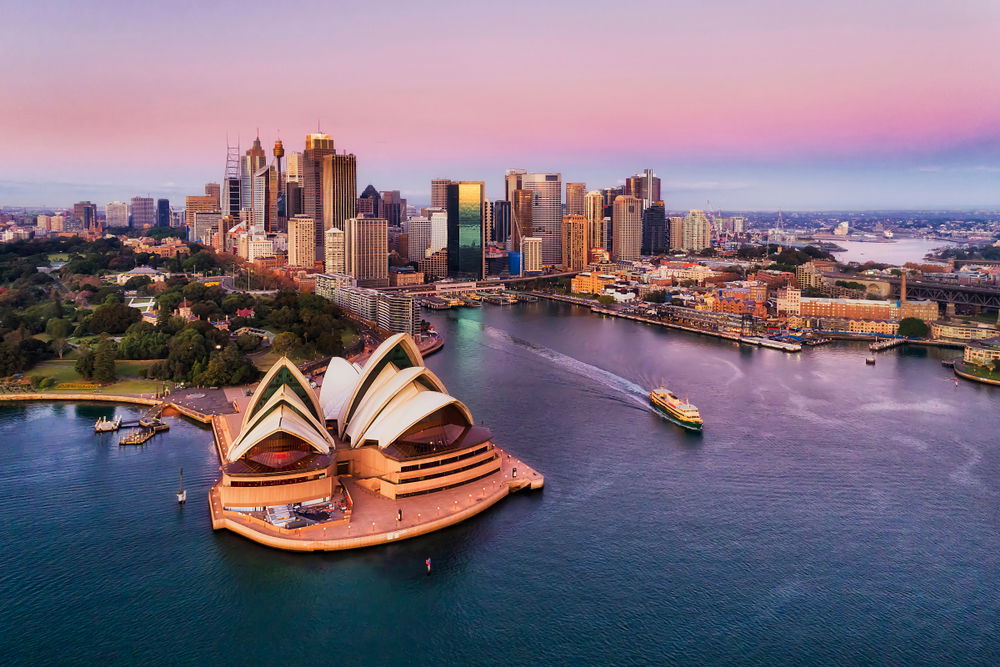 Sydney Opera House, Water, Building, Sky, Water resources, Daytime, Boat, Skyscraper, World, Tower block, Dusk