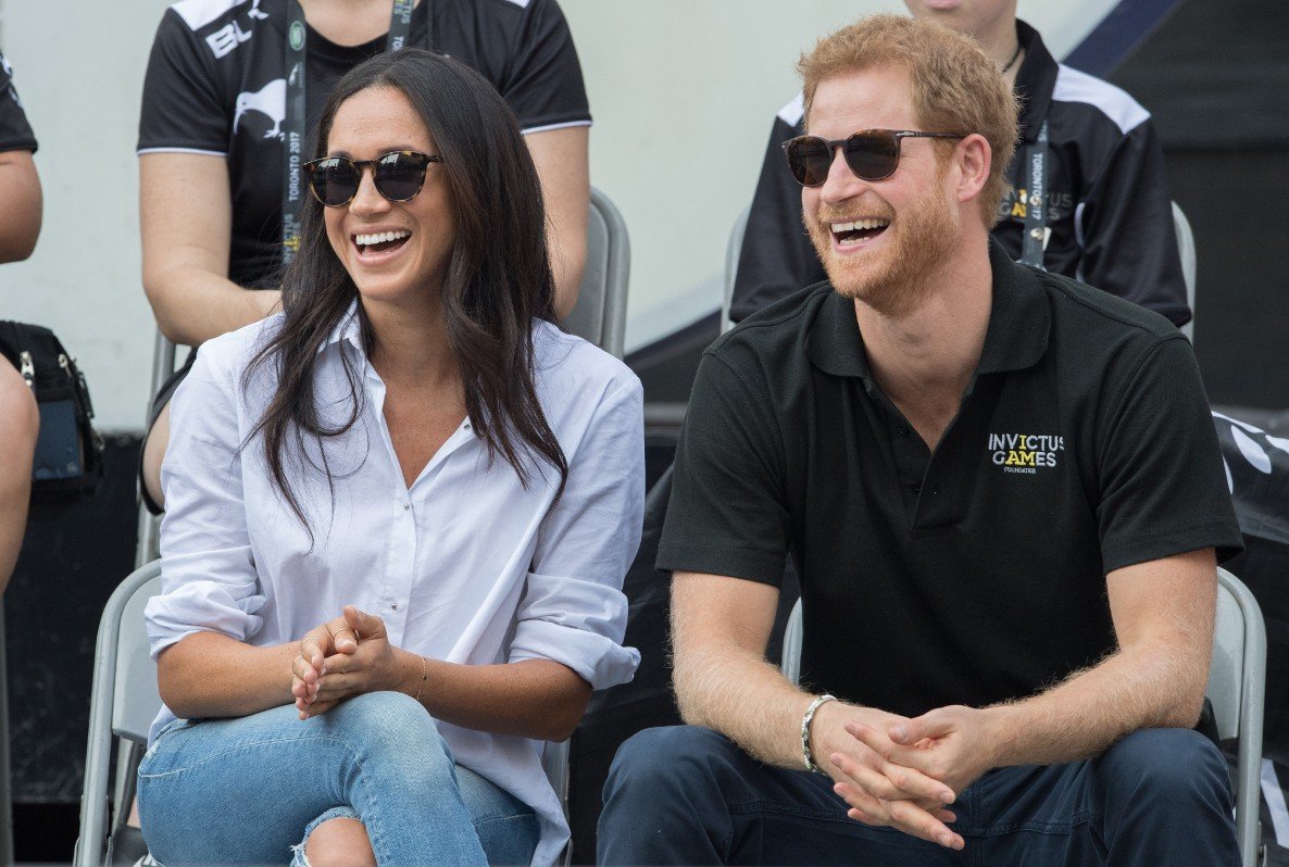 Harry And Meghan Beginning, Smile, Glasses, Goggles, Vision care, Muscle, Sunglasses, Eyewear, Hat, Sleeve, Gesture