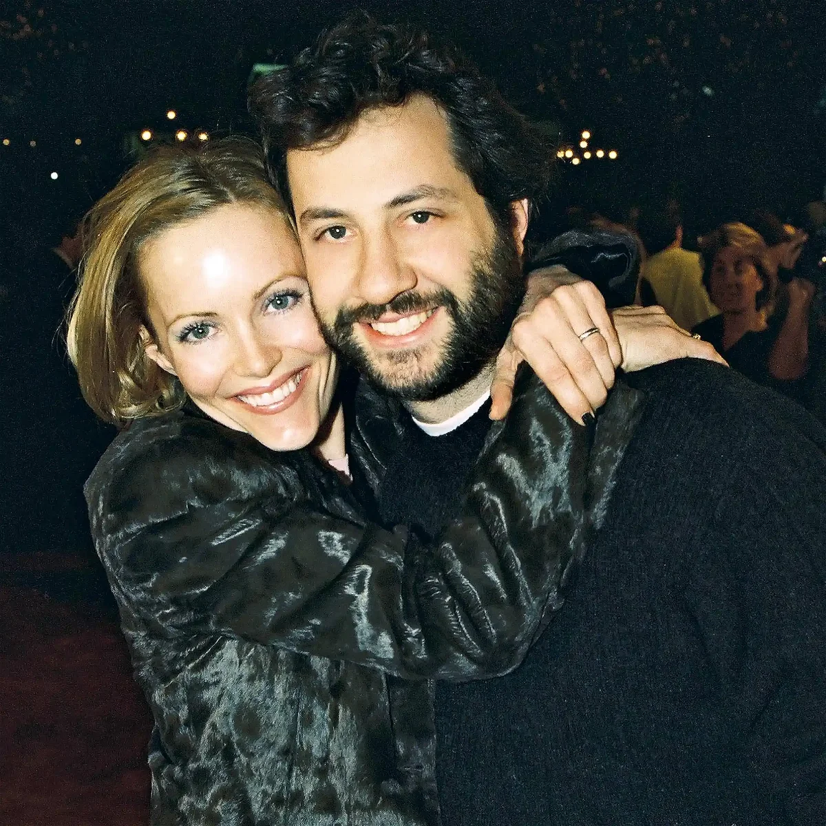 Leslie Mann And Judd Apatow Young, Forehead, Cheek, Lip, Smile, Chin, Outerwear, Eyebrow, Facial expression, Flash photography, Beard