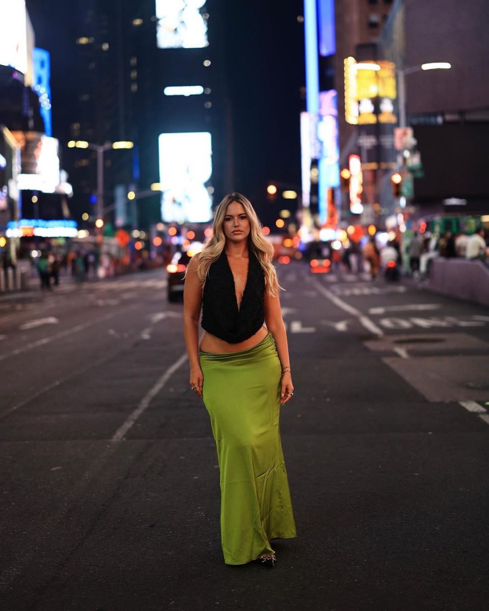 Times Square, Automotive lighting, Flash photography, Road surface, Dress, Standing, Asphalt, Car
