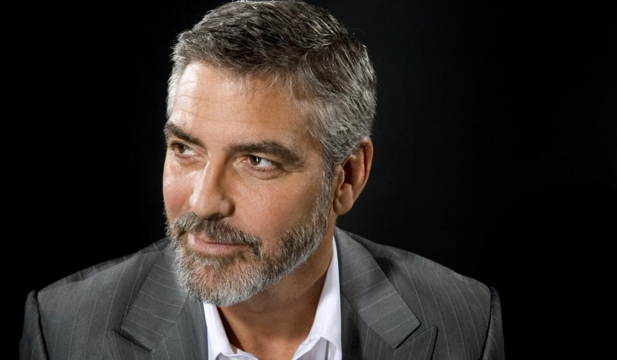 George Clooney, Forehead, Hair, Cheek, Chin, Hairstyle, Eyebrow, Facial expression, Beard, Dress shirt